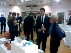 Admiring ceramics at the Private View